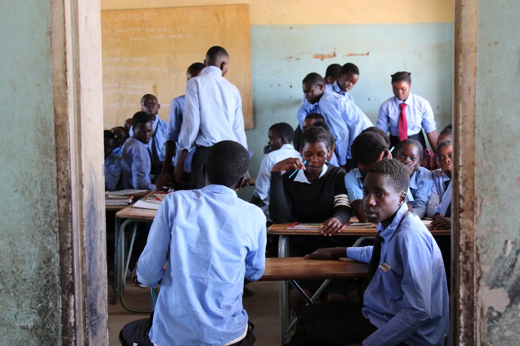 A classroom seen through an open doorway